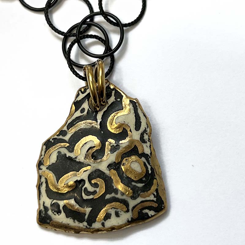 Gold and Black Organic Swirl Pendant Necklace